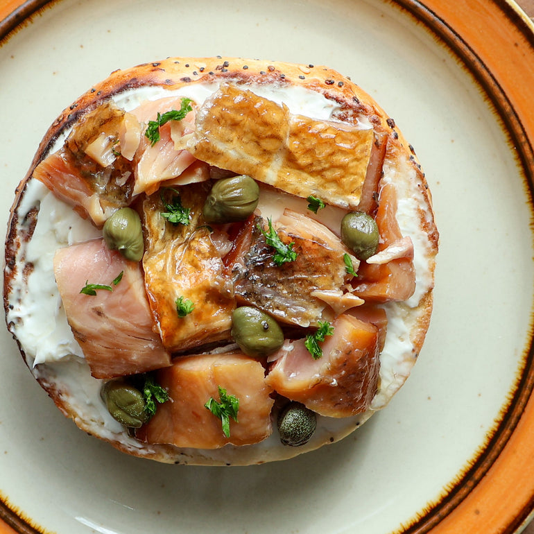 Great Lakes Tinned Fish Smoked Whitefish w/ Lemon & Dill on a toasted bagel with cream cheese